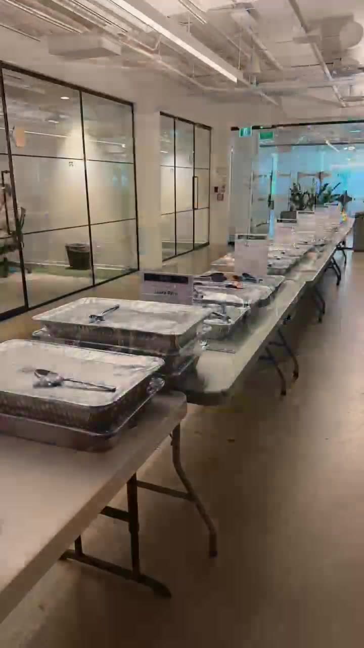 Long IndiaWaale corporate buffet with labeled hot food trays for more than 200 Ecobee guests