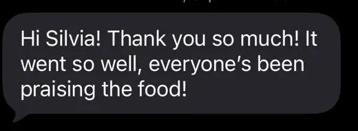 Client message saying the event went well and everyone was praising IndiaWaale's food