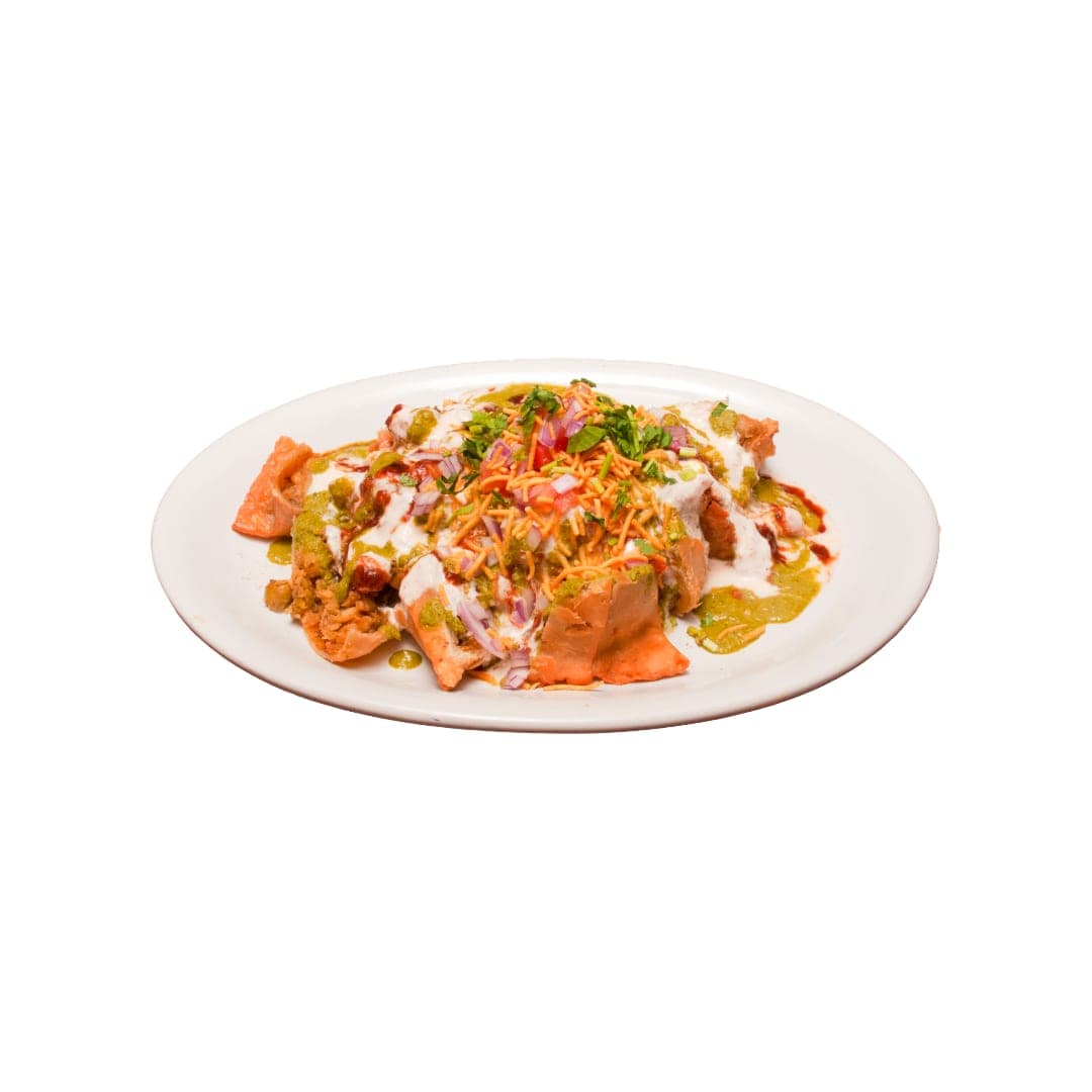Samosa chaat topped with chole, yogurt, green chutney and crispy sev at IndiaWaale North York